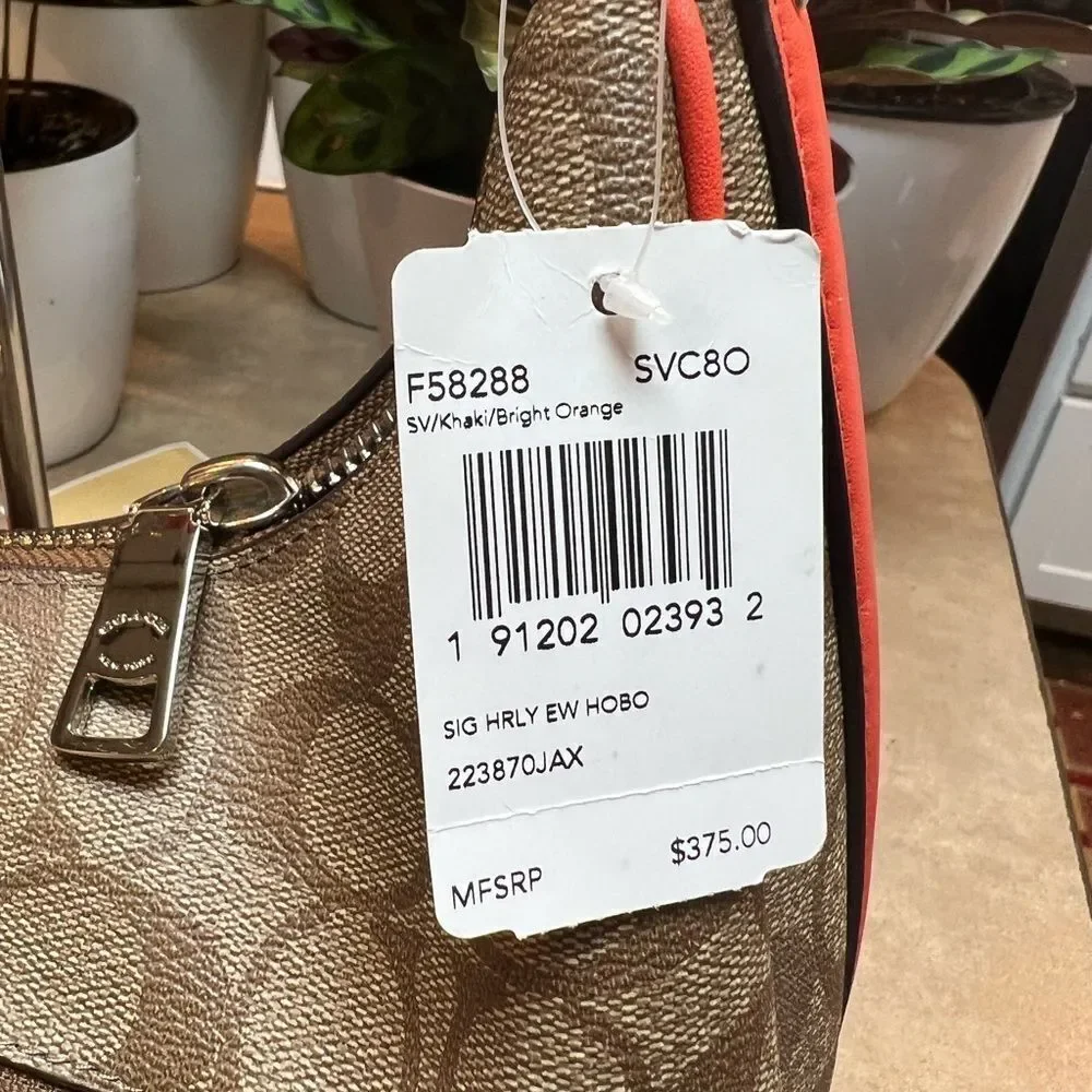 🔥🎁NWT! Coach Sig Harley EW Hobo Handbag Msrp:$375.00